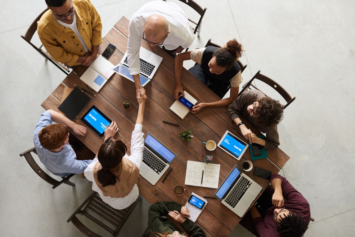 Directors and counsel reviewing a regulatory response in a boardroom